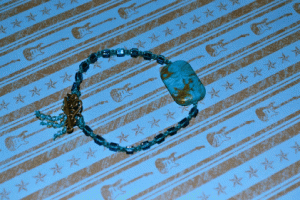 Teal blue knotted bracelet